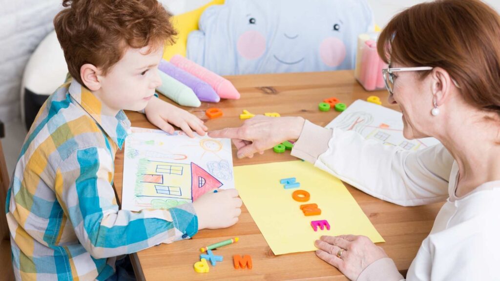 Art therapy session with child with autism