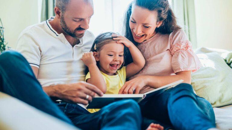 Family reading together as part of a supportive daily routine